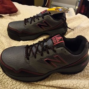 New balance work shoes. Steel toe never worn brand new. Super cute!! Don't fit.